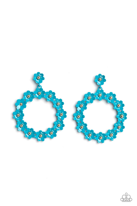 Paparazzi Accessories Daisy Meadows - Blue Hanging from a solitaire blue daisy, a dainty collection of blue daisies bloom into a free-spirited wreath below the ear. Gold studs gleam from the centers of the tactile flowers, adding an industrial sheen to th