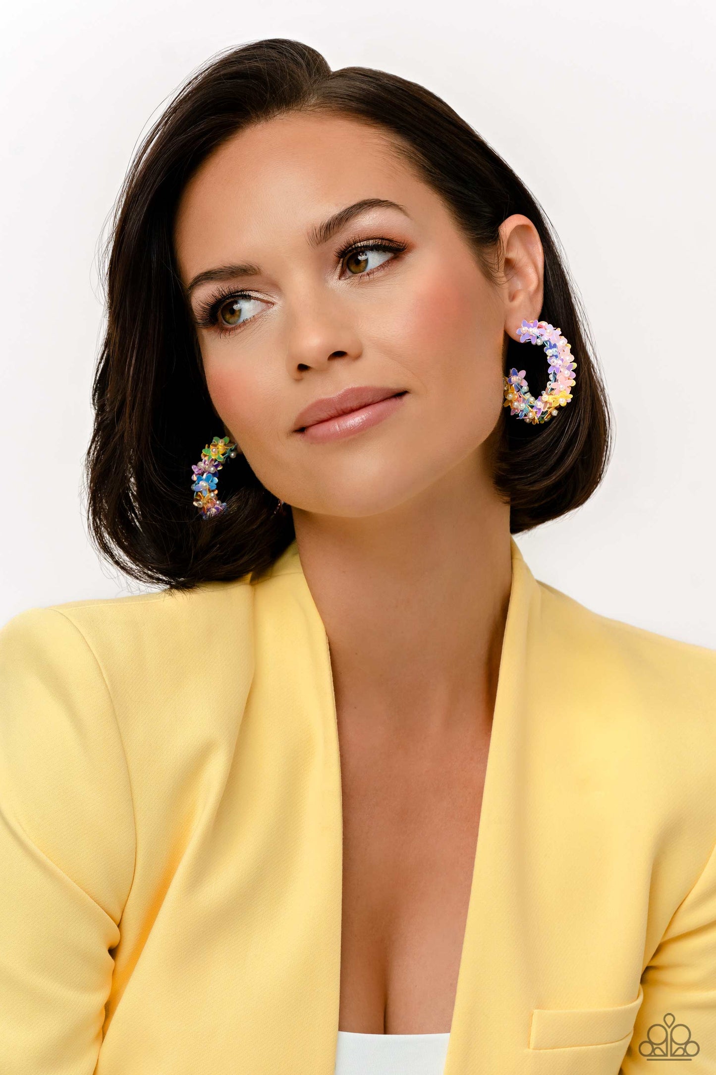 Paparazzi Accessories Fairy Fantasia - Multi A floral explosion, encompassing the entirety of a thick silver hoop, features reflective light blue, pink, and yellow flowers dotted with dainty pearl centers for a dreamy, whimsicality below the ear. Earring