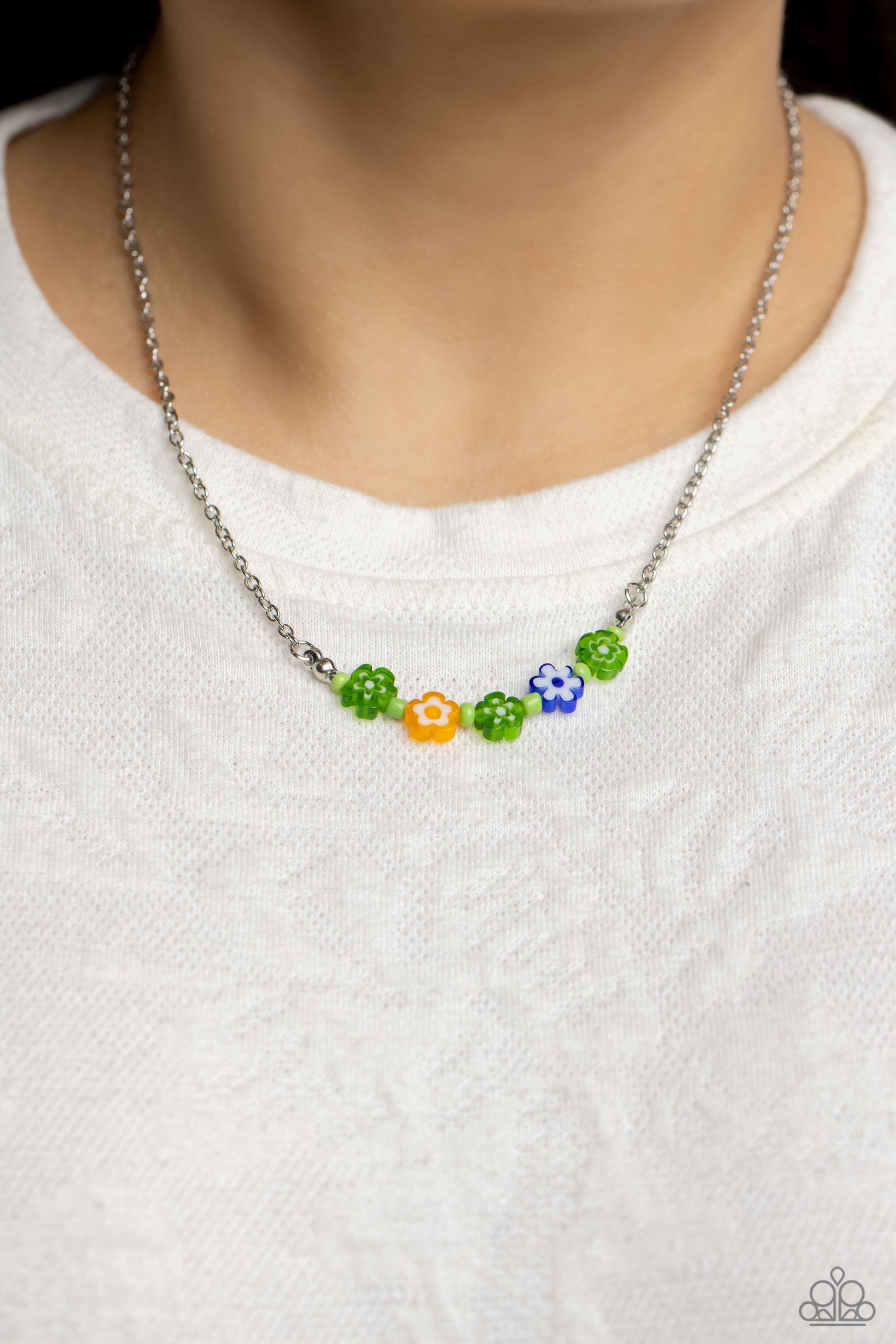 Paparazzi Accessories BOUQUET We Go - Green Infused at the bottom of a dainty silver chain, a row of flower beads in shades of green, yellow, and blue rest below the neckline. Separating each floral bead, green seed beads create additional pops of color a