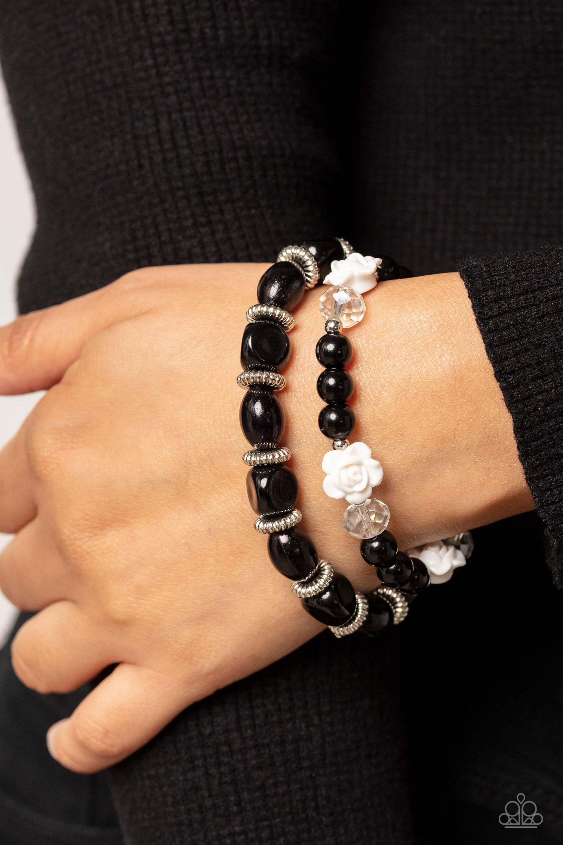 Paparazzi Accessories Who ROSE There? - Black Silver studded rings, varying shapes of black beads, silver accents, faceted clear beads, and white resin roses stretch across elastic stretchy bands around the wrist for a refined, floral display. Sold as one