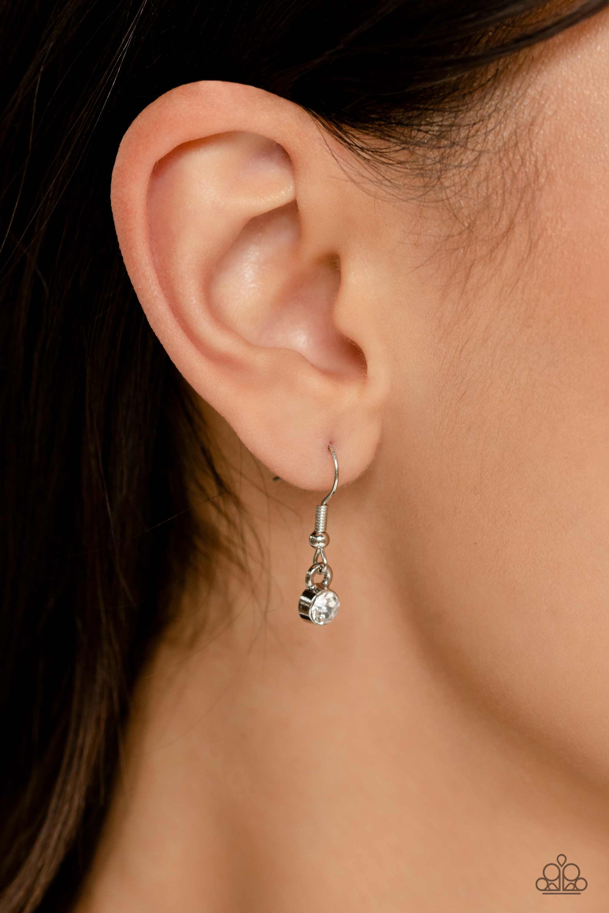 Paparazzi Accessories Crowning Collection - Multi Featuring pronged silver fittings, a sparkly series of marquise-cut rhinestones in varying sizes and opacities are splashed in hues of purple, blue, light blue, baby pink, pink, and green as they fan out b