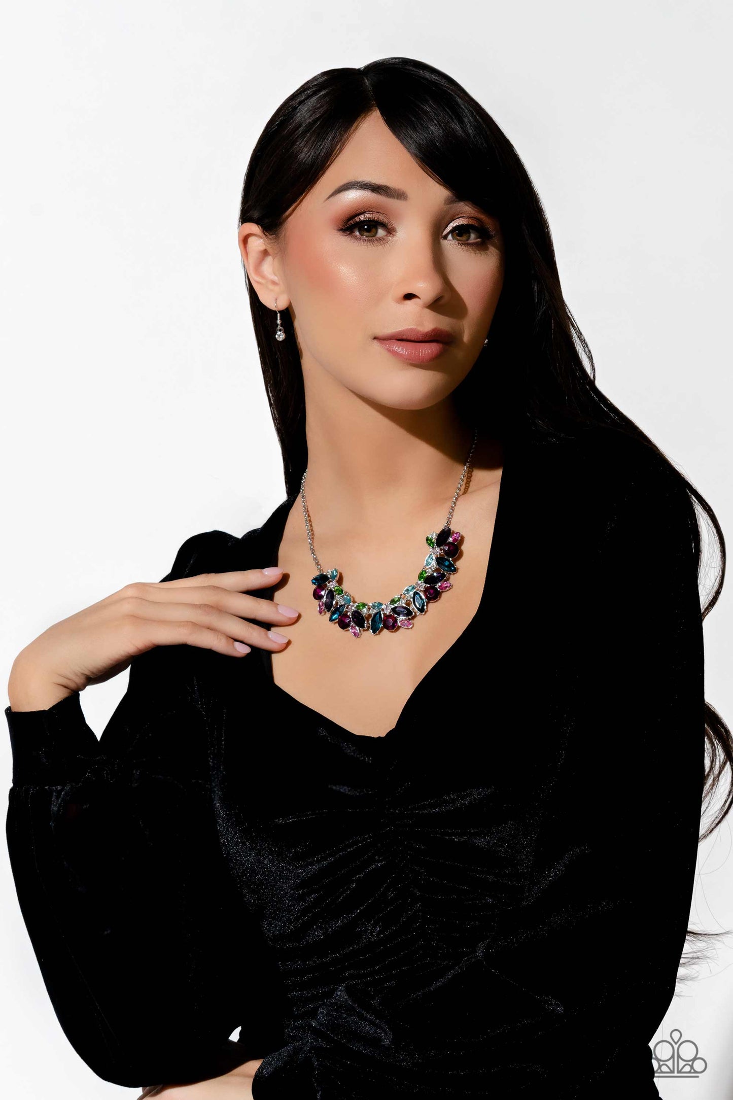 Paparazzi Accessories Crowning Collection - Multi Featuring pronged silver fittings, a sparkly series of marquise-cut rhinestones in varying sizes and opacities are splashed in hues of purple, blue, light blue, baby pink, pink, and green as they fan out b