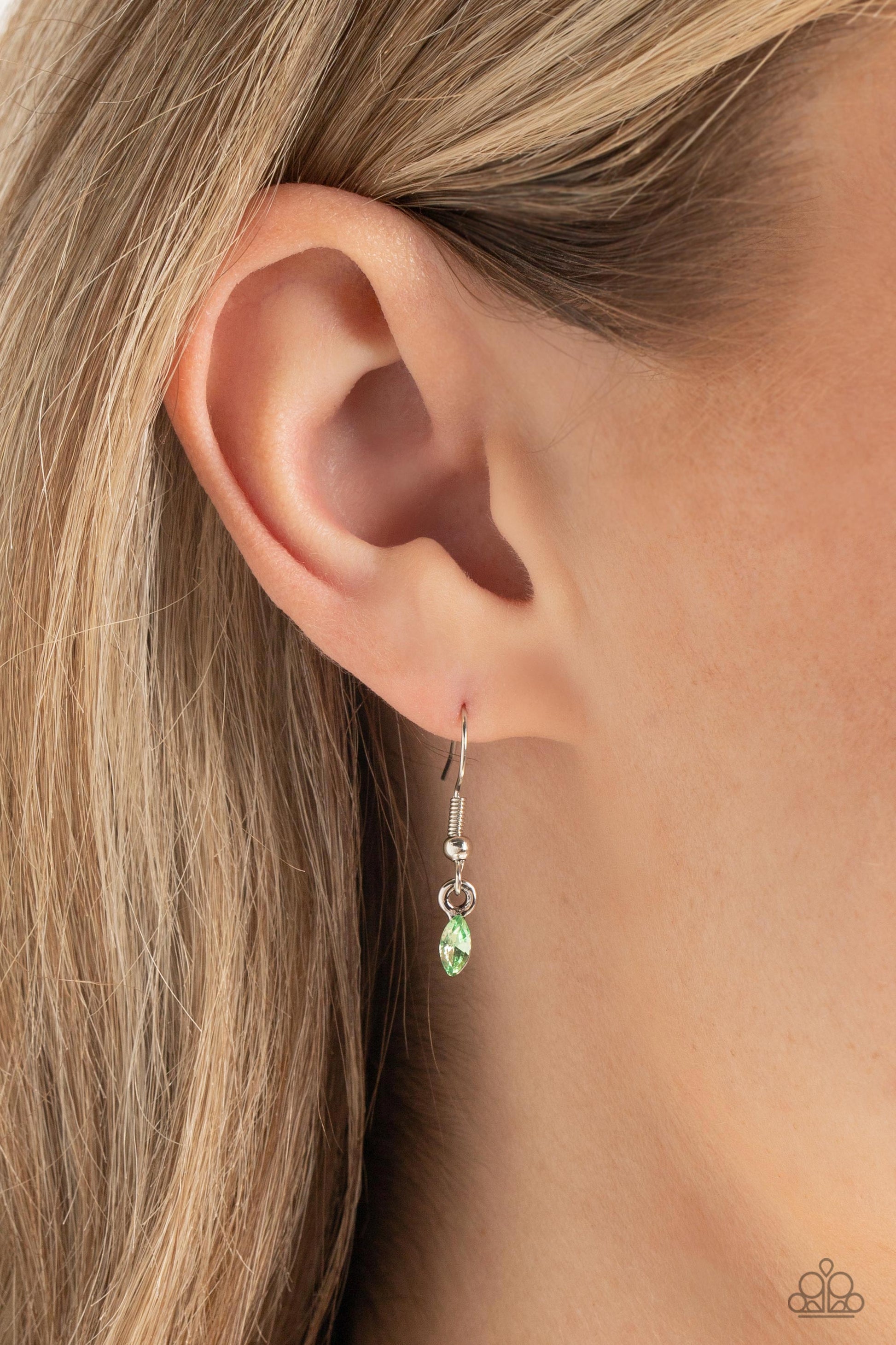 Paparazzi Accessories Dynamic Dragonfly - Green Falling from a high-sheen silver chain, a thick oval pendant with a faceted clear center lengthens the torso as it swings from the bottom of the chain. Swinging from the center of the shimmery pendant, an in