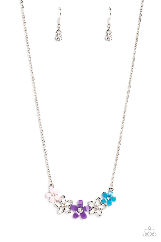 Paparazzi Accessories WILDFLOWER About You - Purple Airy silver flowers with white gem centers intermingle with baby pink, purple, and blue acrylic flowers that bloom around dainty white gem centers for a colorfully floral display below the collar. Featur