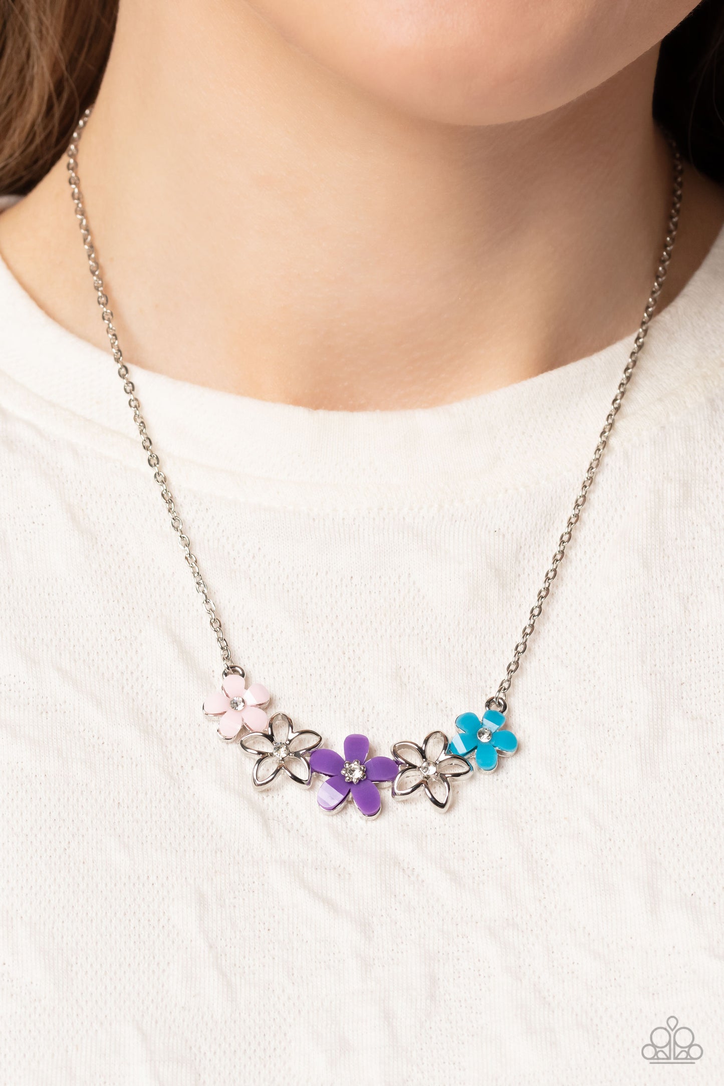 Paparazzi Accessories WILDFLOWER About You - Purple Airy silver flowers with white gem centers intermingle with baby pink, purple, and blue acrylic flowers that bloom around dainty white gem centers for a colorfully floral display below the collar. Featur