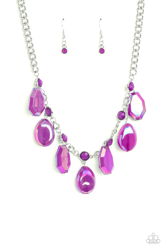 Paparazzi Accessories Maldives Mural - Purple A collection of chiseled, clear and milky geometric shapes in purple hues feature an oil spill overlay as they cascade from a silver curb chain, resulting in a bubbly and boisterous fringe below the collar. A