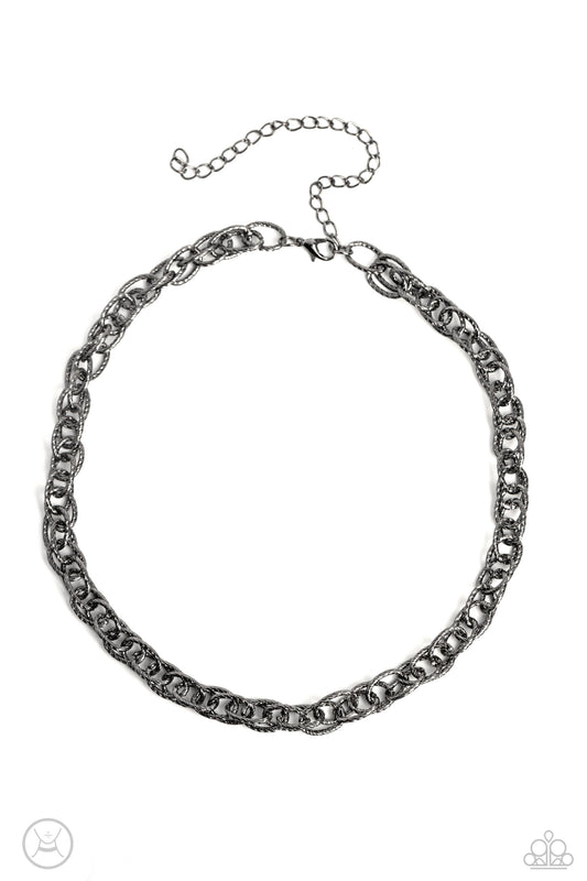 Paparazzi Accessories If I Only Had a CHAIN - Black A strand of textured double gunmetal links drapes down the neckline in a stunning industrial display. The textured links catch and reflect the light at every angle, adding breathtaking shimmer to the mon