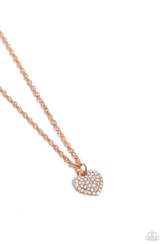 Paparazzi Accessories Goin Courtin - Copper Encrusted in white rhinestones, a shiny copper heart slides along a dainty shiny copper chain, creating a heartfelt pendant below the collar. Features an adjustable clasp closure. Sold as one individual necklace