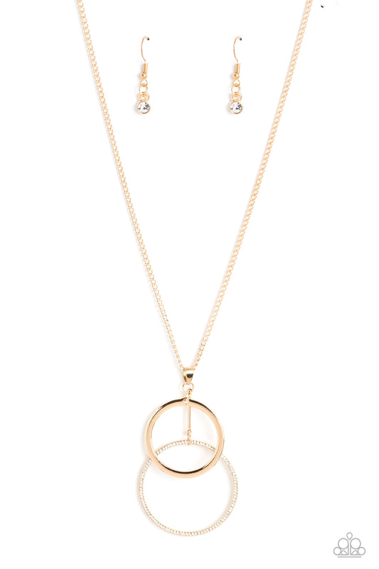 Paparazzi Accessories Wishing Well Whimsy - Gold Falling from a classic gold chain, a high-sheen gold ring is overlapped by a bigger gold ring embossed with dainty white rhinestones for a simple, scintillating statement. Features an adjustable clasp closu