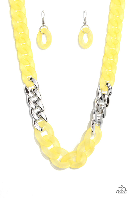 Paparazzi Accessories Curb Your Enthusiasm - Yellow Brushed in a vibrant Empire Yellow finish, a strand of acrylic curb chain combines with links of a silver curb chain to dramatically drape across the chest for a whimsical yet bold look. Features an adju