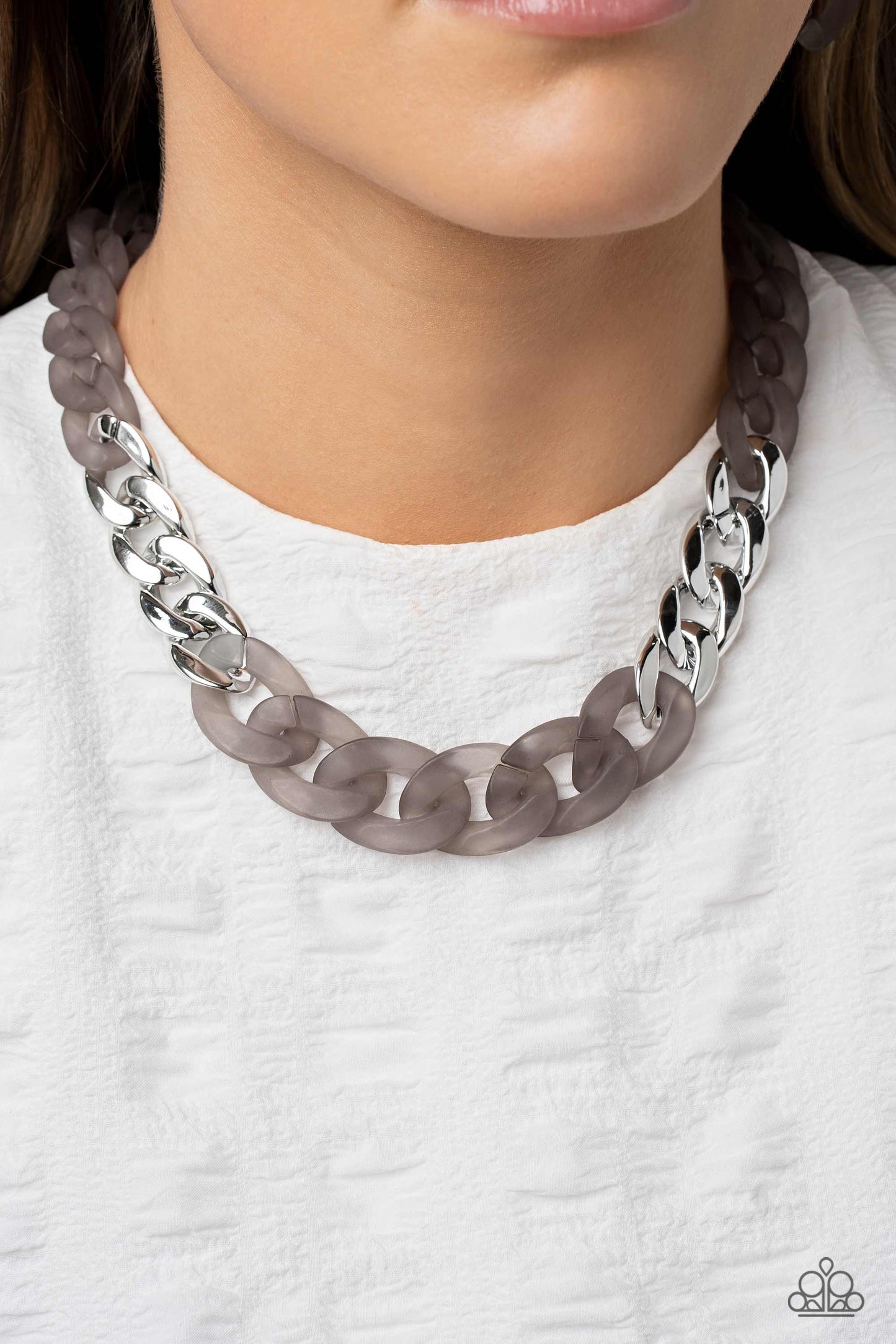 Paparazzi Accessories Curb Your Enthusiasm - Silver Brushed in a Poppyseed finish, a strand of acrylic curb chain combines with links of a silver curb chain to dramatically drape across the chest for a whimsical yet bold look. Features an adjustable clasp