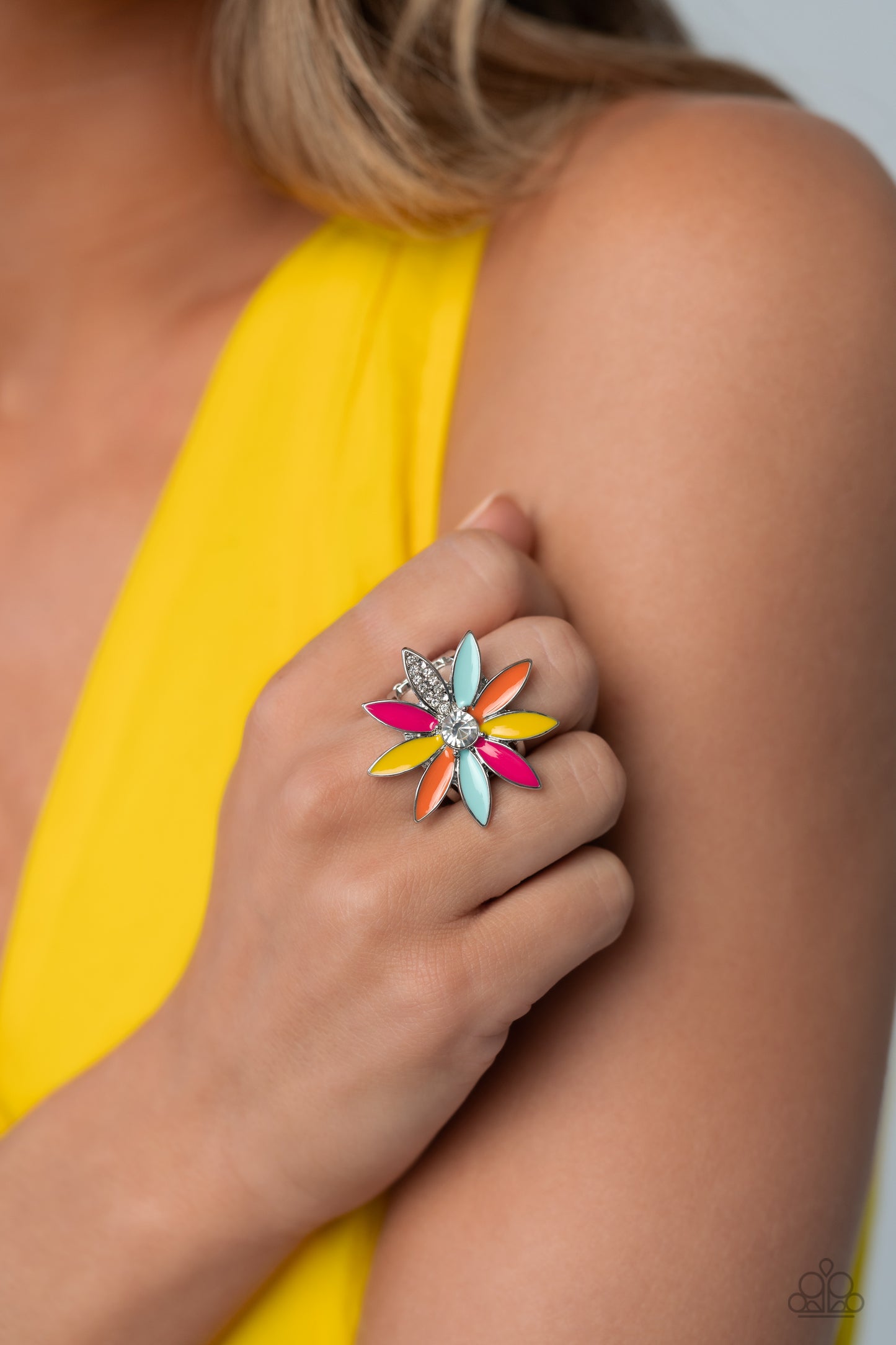 Paparazzi Accessories Lily Lei - Multi Featuring Pink Peacock, Samoan Sun, Orange Tiger and Waterspout elongated marquise petals, an oversized glittery colorful flower, with a white gem center, blooms atop an airy silver band. Dainty white rhinestones dot