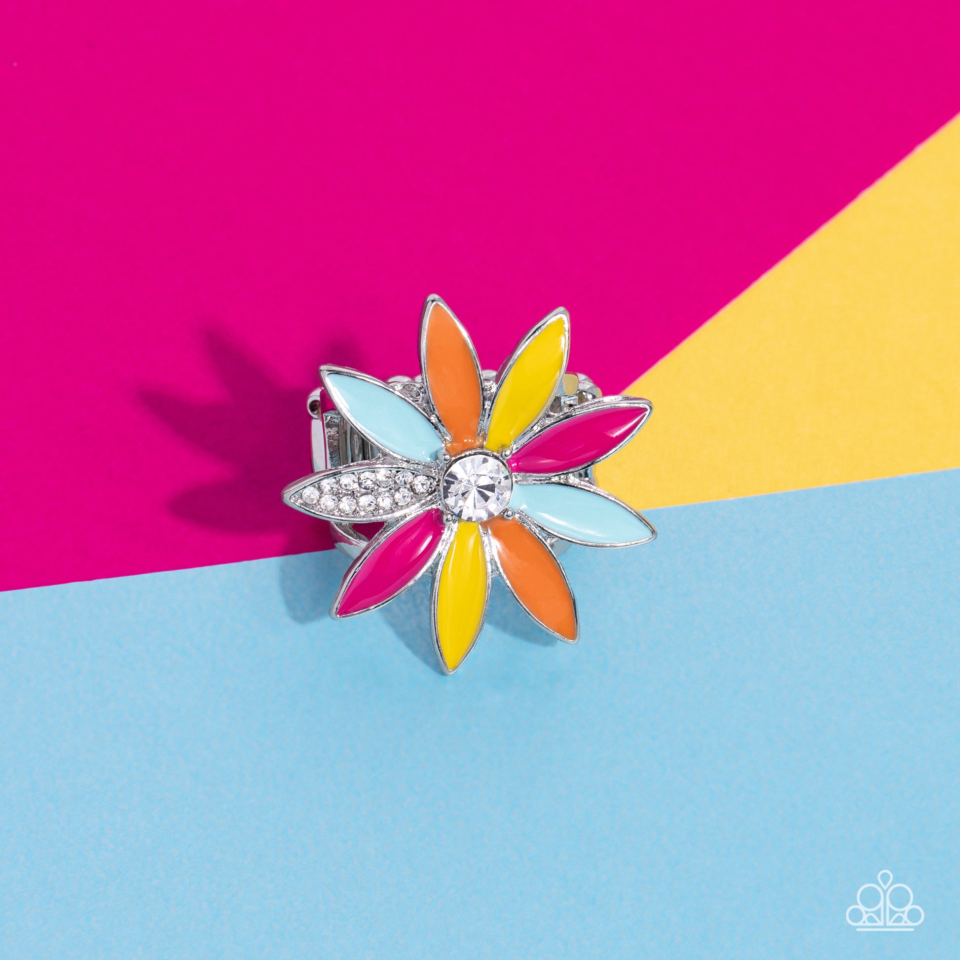 Paparazzi Accessories Lily Lei - Multi Featuring Pink Peacock, Samoan Sun, Orange Tiger and Waterspout elongated marquise petals, an oversized glittery colorful flower, with a white gem center, blooms atop an airy silver band. Dainty white rhinestones dot