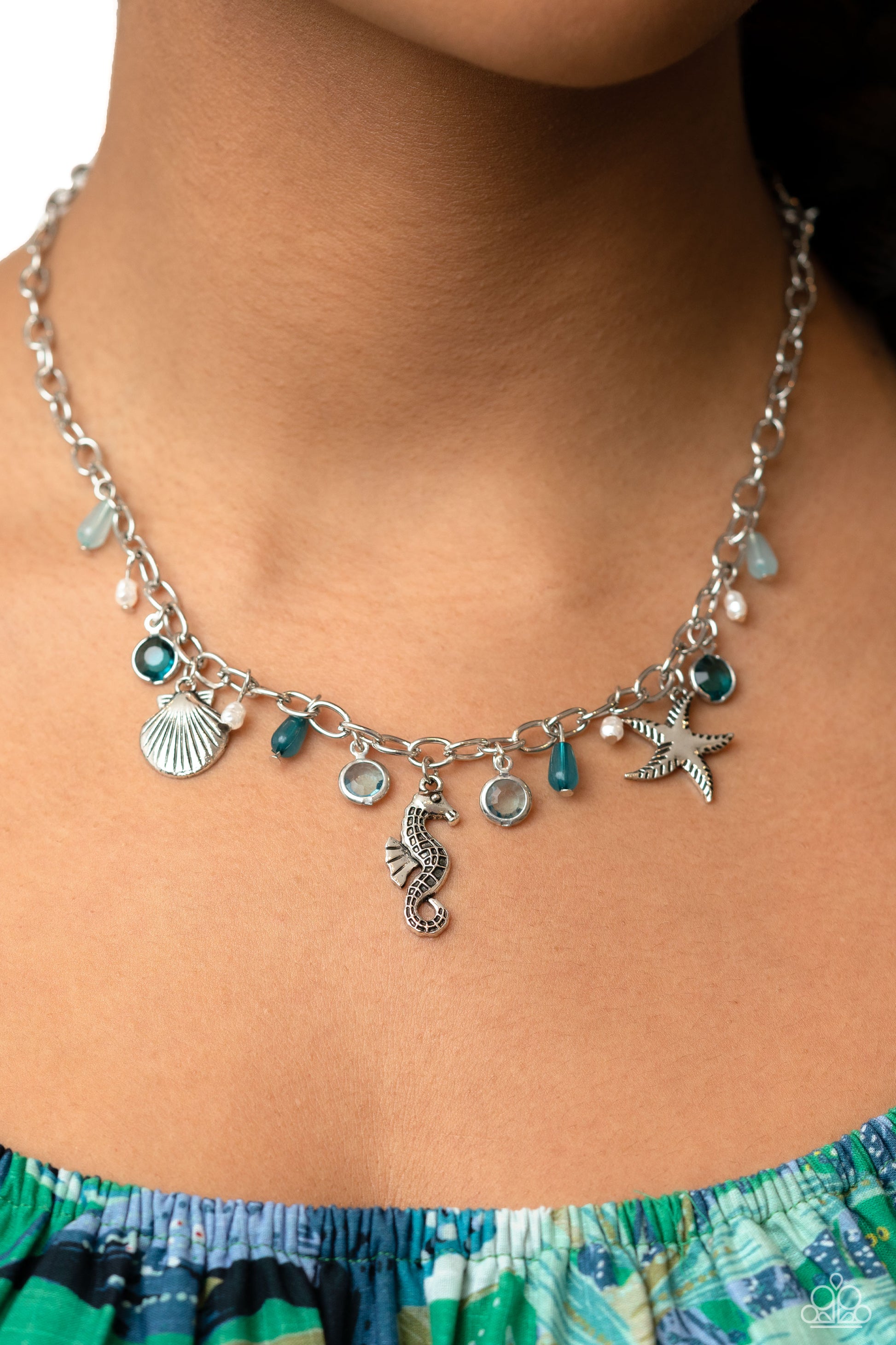 Paparazzi Accessories Seahorse Season - Blue Dainty baroque pearls, clear Harbor Blue and Waterspout faceted beads in silver frames, intricate silver seahorse, starfish, and sea scallop seashell charms, and milky Harbor Blue and Waterspout teardrop beads