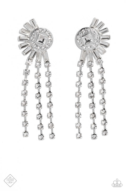 Paparazzi Accessories Torrential Twinkle - White Encased in square silver fittings, three strands of dainty, glistening, white gems cascade from a blindingly ornate circular frame. Emerald-cut white gems explode from the rhinestone-dusted frame for additi