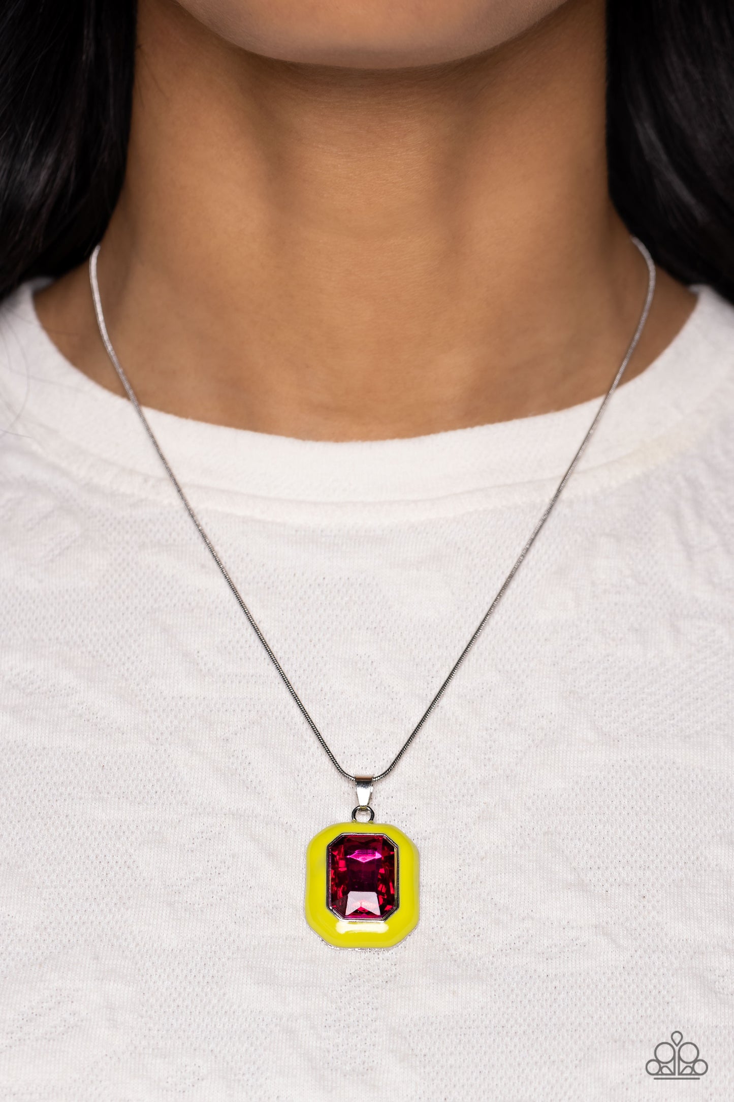 Paparazzi Accessories Emerald Energy - Multi An oversized, fuchsia emerald-cut gem is bordered by a frame of neon Love Bird, creating a bright pendant that swings from the bottom of a silver snake chain. Features an adjustable clasp closure. Sold as one i