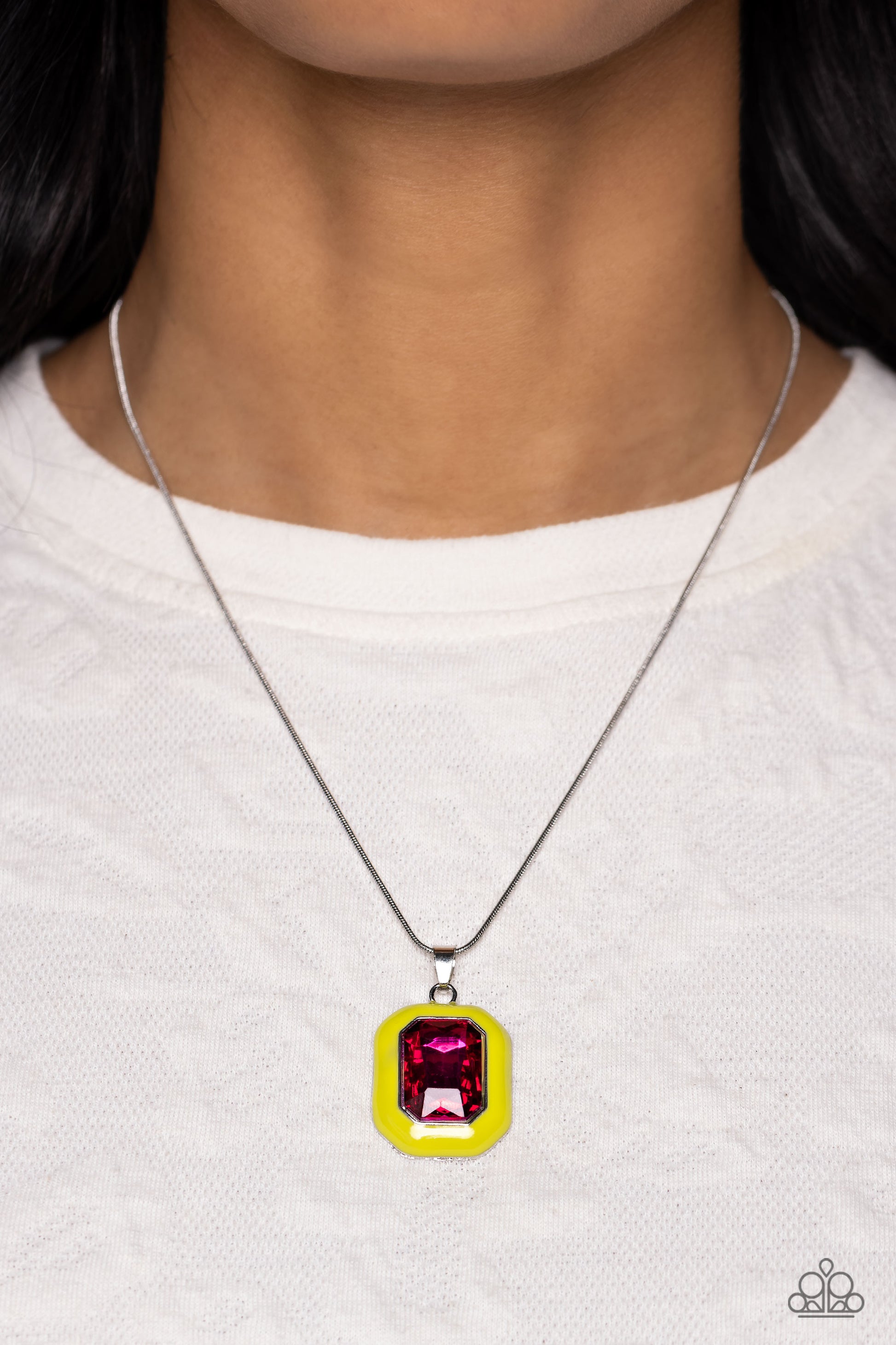 Paparazzi Accessories Emerald Energy - Multi An oversized, fuchsia emerald-cut gem is bordered by a frame of neon Love Bird, creating a bright pendant that swings from the bottom of a silver snake chain. Features an adjustable clasp closure. Sold as one i