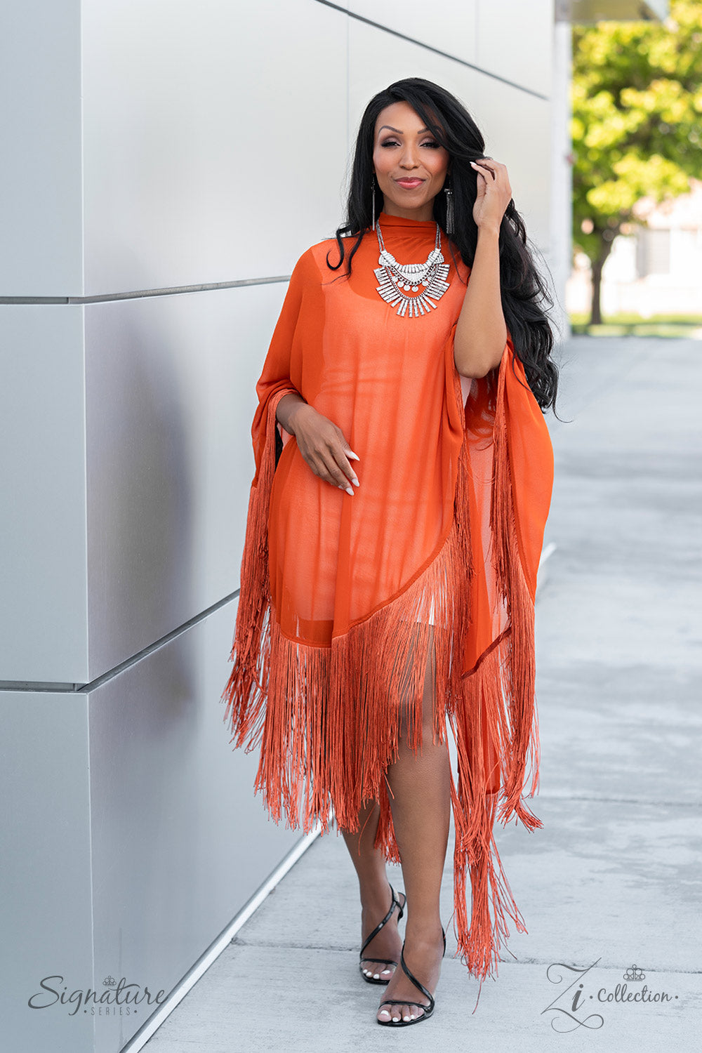 Paparazzi Accessories The Nedra Oversized chain links, silver discs hammered in texture, and a blinding display of brilliant white rhinestones combine to create an iconic statement piece. At the top of the elaborate display, three spade-like pendants fill