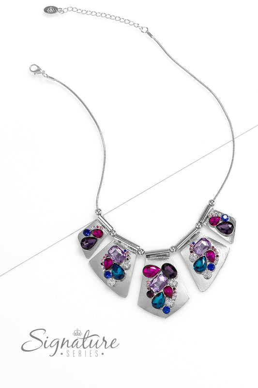 Paparazzi Accessories The Laura Shimmery silver plates slide along a skinny snake chain, with sleek metallic beads separating each one. Clusters of faceted gems are haphazardly staggered across the surface of each silver canvas, emitting a treasure trove