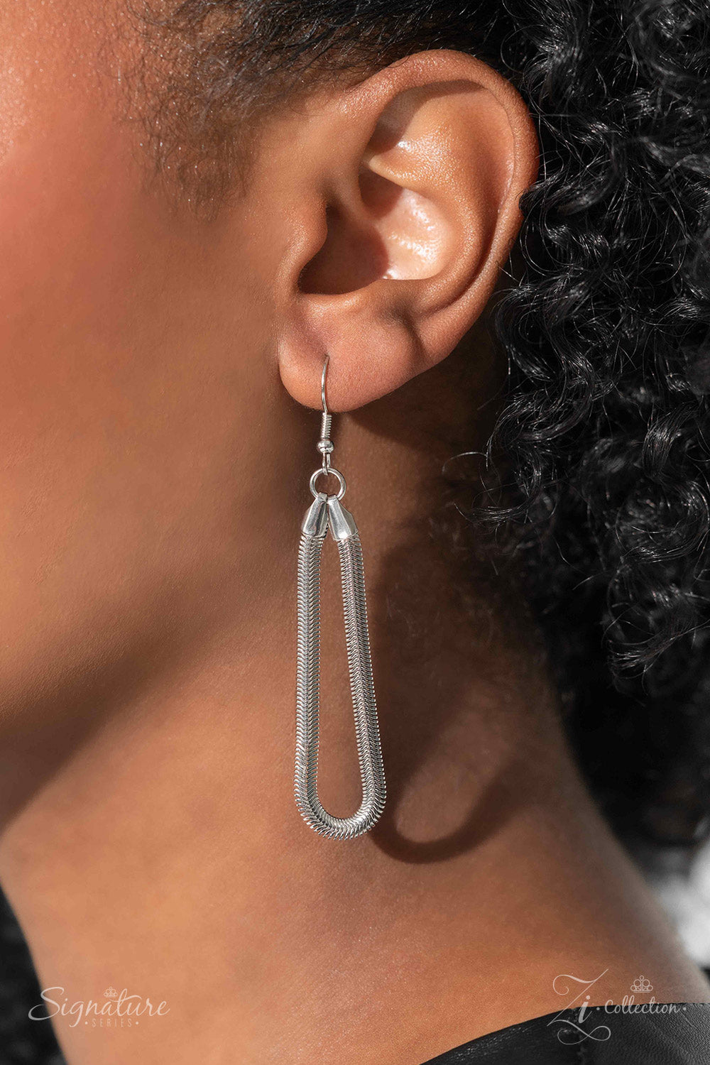 Paparazzi Accessories The Linda Strand after strand of sleek, flat, snake chain cascade down the chest in dreamy defiance. Alternating in flawless finishes of silver and gold, each metallic tier extends a little farther than the last, building into a mixe