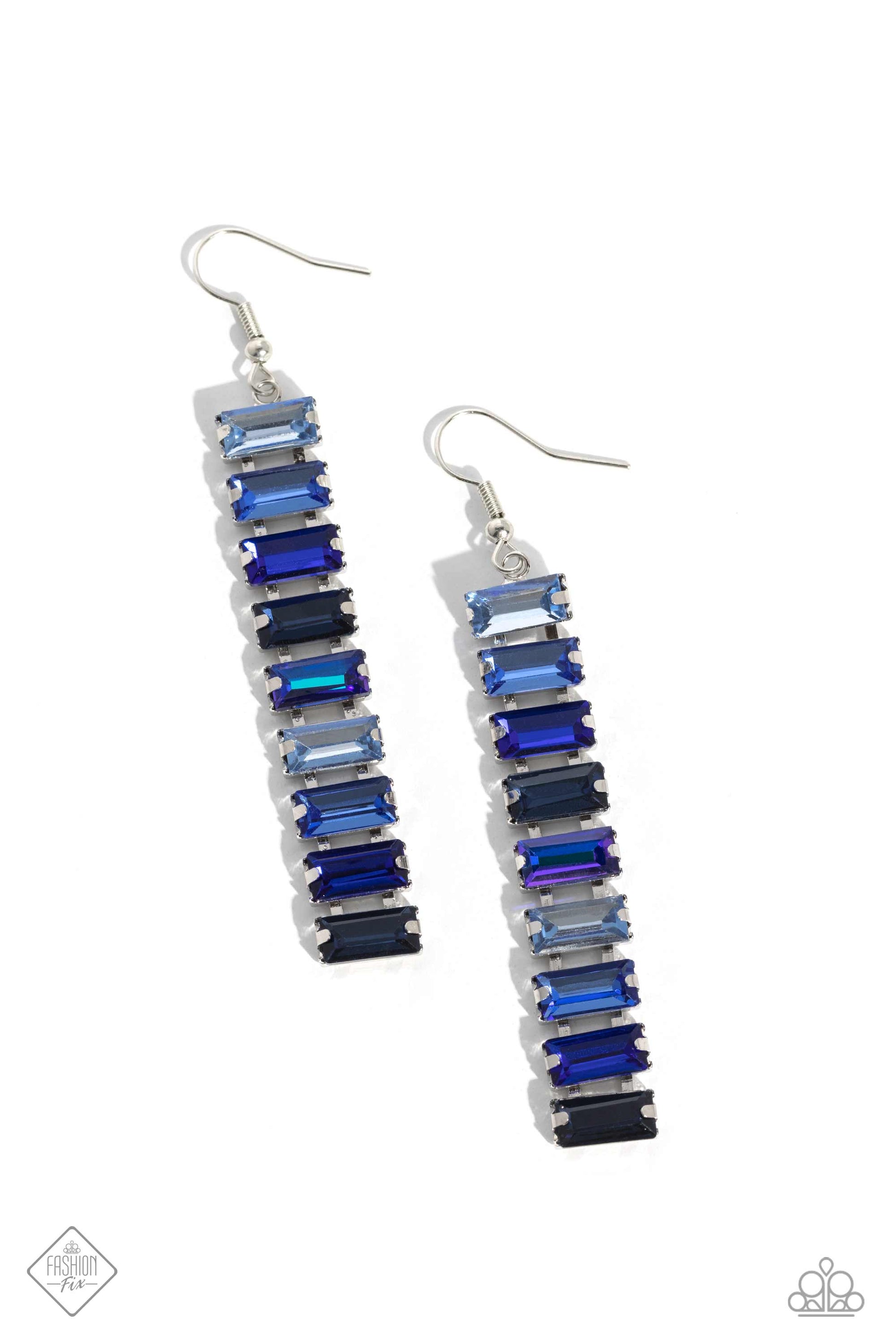 Paparazzi Accessories Superbly Stacked - Blue Set in pronged silver fittings, a glassy collection of emerald-cut gems in varying shades of blue fall in line from the ear, creating a stunning, light-catching lure. Earring attaches to a standard fishhook fi