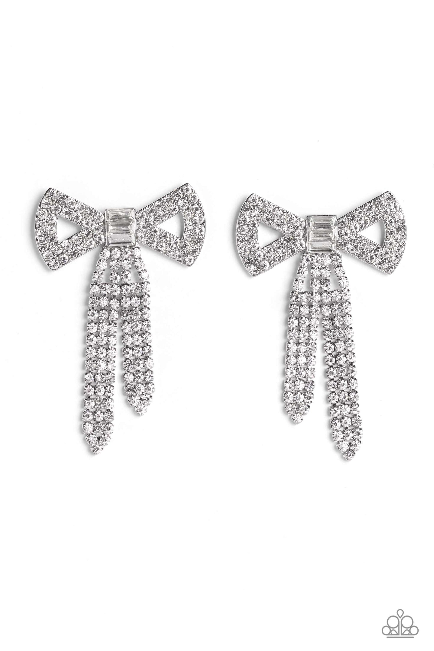Paparazzi Accessories Just BOW With It - White Featuring silver square fittings, high-sheen bands of silver, adorned in sparkling white rhinestones loop into a stunning bow charm, creating a classy statement at the ear. Featured in the center of the class