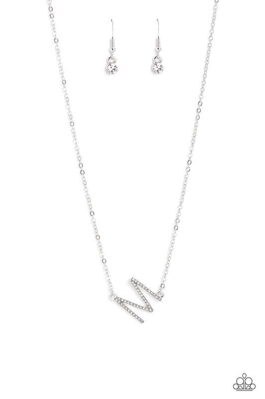 Paparazzi Accessories INITIALLY Yours - M - White Embossed with dainty white rhinestones, a silver letter "M" hovers below the collar from a dainty silver chain, for a sentimentally simple design. Features an adjustable clasp closure. Sold as one individu