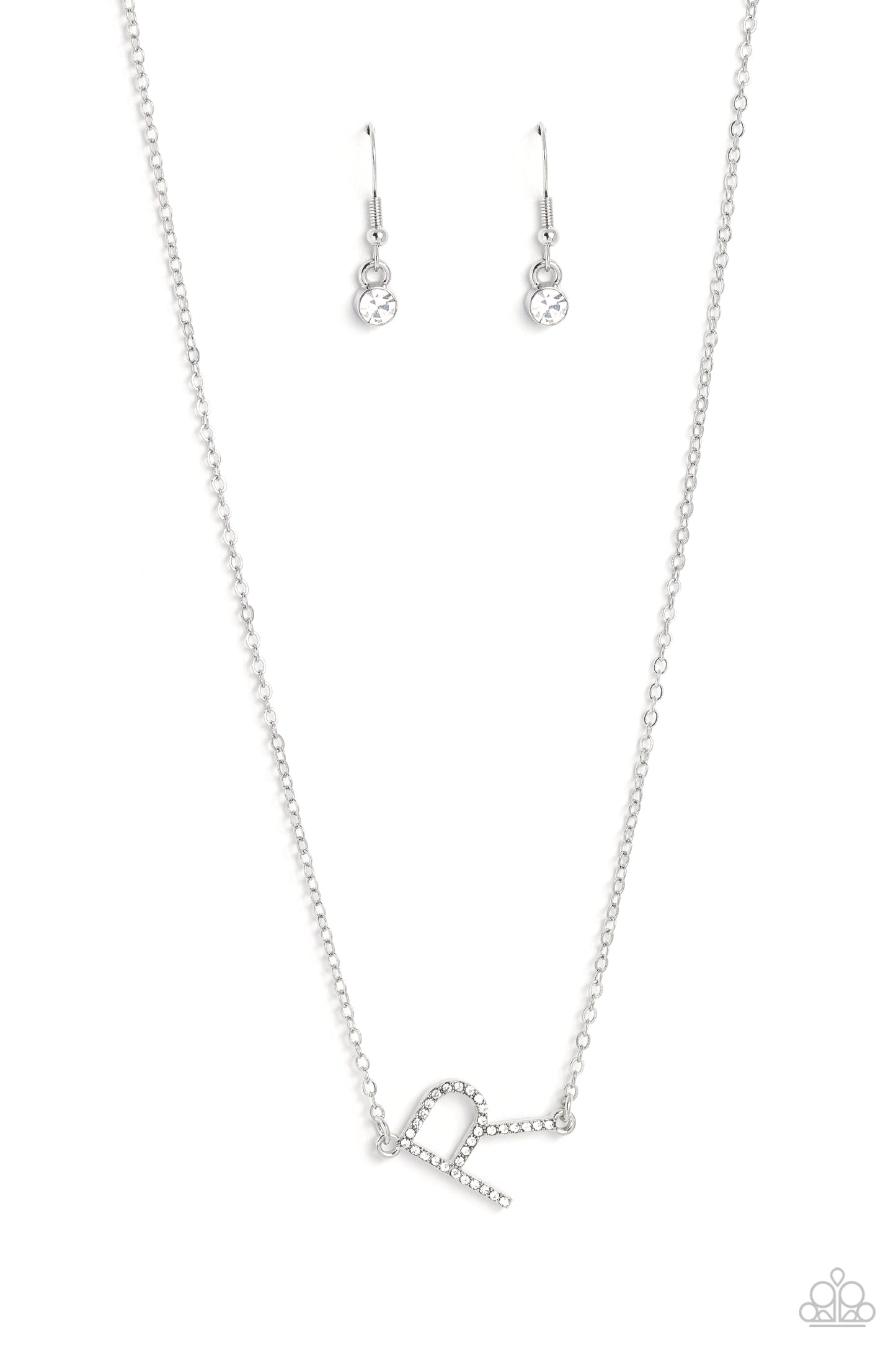 Paparazzi Accessories INITIALLY Yours - R - White Embossed with dainty white rhinestones, a silver letter "R" hovers below the collar from a dainty silver chain, for a sentimentally simple design. Features an adjustable clasp closure. Sold as one individu