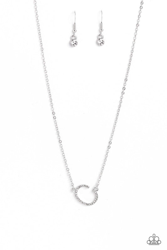 Paparazzi Accessories INITIALLY Yours - C - White Embossed with dainty white rhinestones, a silver letter "C" hovers below the collar from a dainty silver chain, for a sentimentally simple design. Features an adjustable clasp closure. Sold as one individu