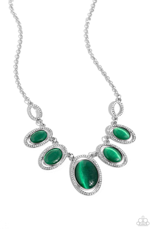 Paparazzi Accessories A BEAM Come True - Green Featuring white rhinestone encrusted oval frames, a mesmerizing collection of glowing green cat's eye stones delicately link below the collar for an ethereal pop of color. Features an adjustable clasp closure