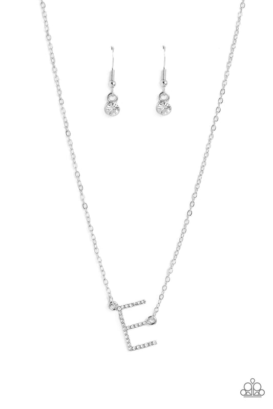 Paparazzi Accessories INITIALLY Yours - E - White Embossed with dainty white rhinestones, a silver letter "E" hovers below the collar from a dainty silver chain, for a sentimentally simple design. Features an adjustable clasp closure. Sold as one individu