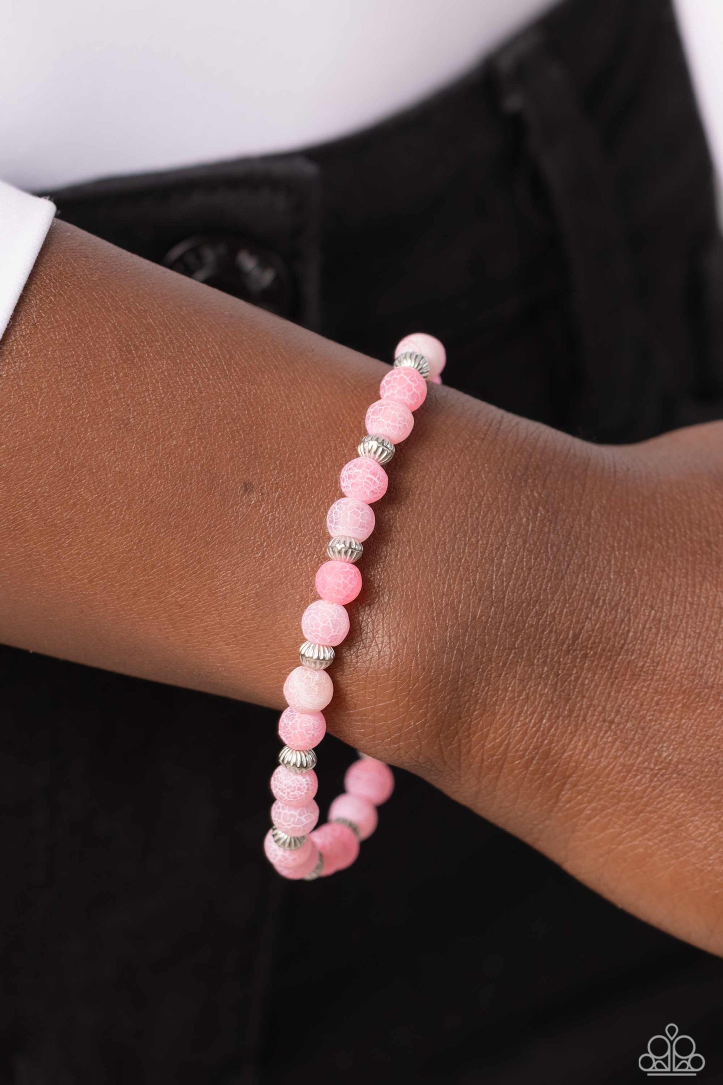 Paparazzi Accessories Ethereally Earthy - Pink Featuring a dainty crackle motif, pink stones in varying shades and textured silver beads wrap around the wrist on a stretchy band for an ethereally earthy statement. As the stone elements in this piece are n