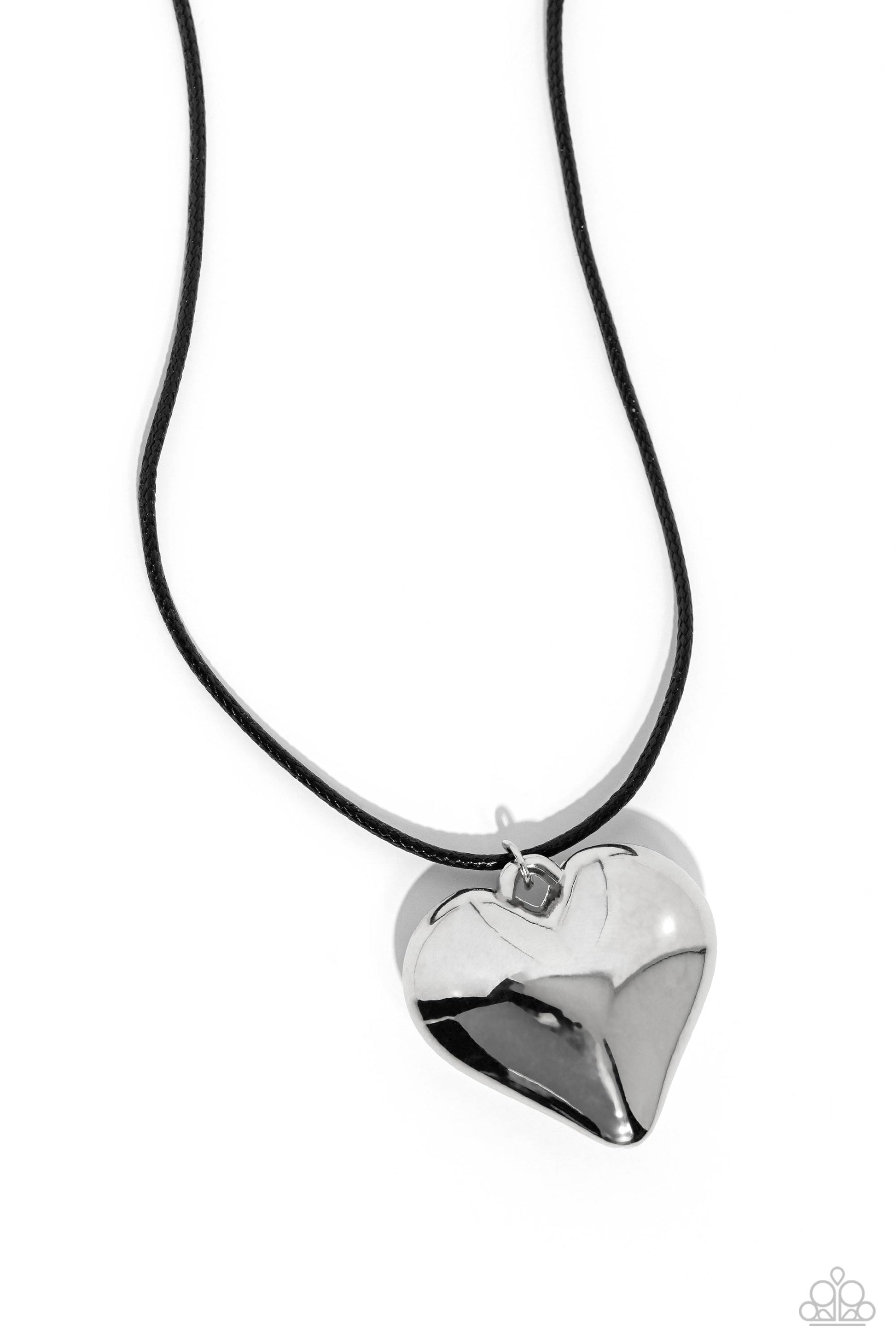 Paparazzi Accessories CORDED Love - Black Brushed in a high-sheen finish, an oversized silver heart pendant swings from the bottom of a skinny black leather cord, creating a rustically romantic statement. Features an adjustable clasp closure. Sold as one