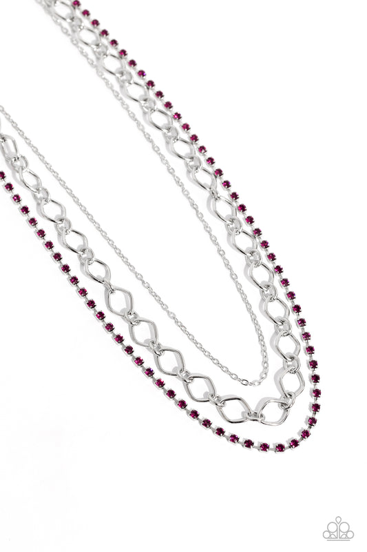 Paparazzi Accessories Tasteful Tiers - Pink A dainty strand of fuchsia rhinestones, set in silver square fittings, joins a dainty silver strand of silver chain and a silver oval link chain below the collar, creating refined layers. Features an adjustable