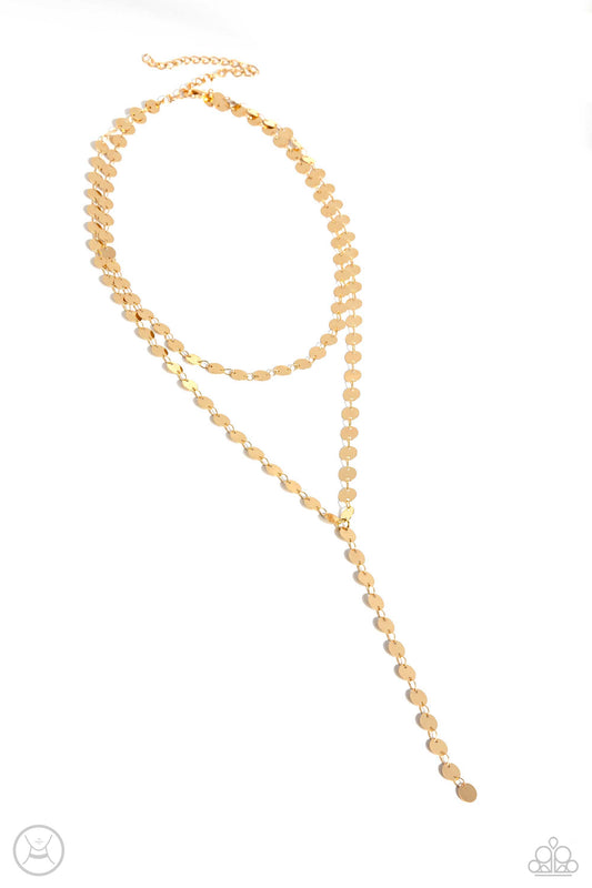 Paparazzi Accessories Reeling in Radiance - Gold High-sheen gold discs trickle around the collar and down the chest, creating an edgy lariat-styled fringe that sways and shimmers. Features an adjustable clasp closure. Sold as one individual choker necklac