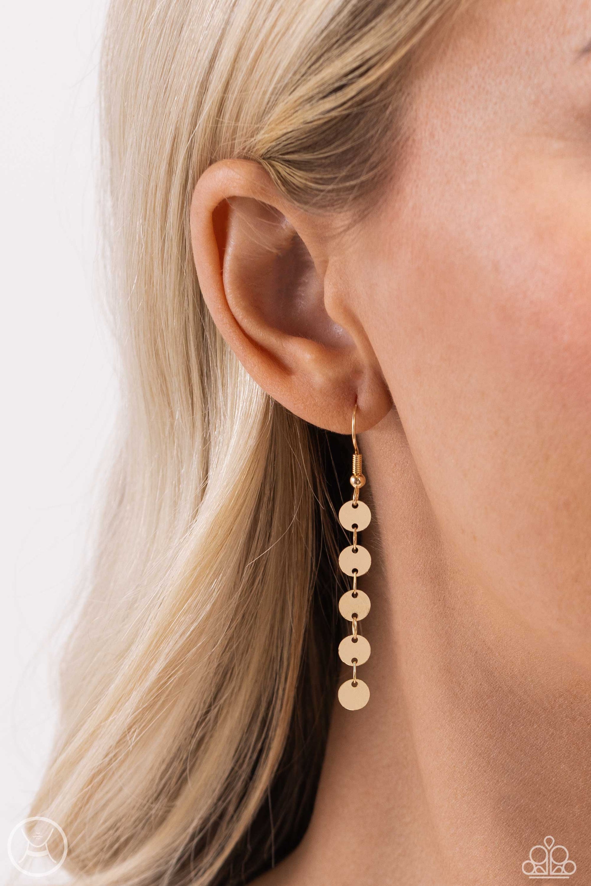 Paparazzi Accessories Reeling in Radiance - Gold High-sheen gold discs trickle around the collar and down the chest, creating an edgy lariat-styled fringe that sways and shimmers. Features an adjustable clasp closure. Sold as one individual choker necklac