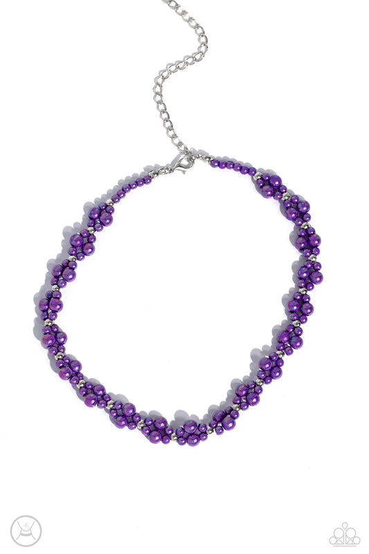 Paparazzi Accessories Dreamy Duchess - Purple Dipped in an iridescent finish, varying sizes of purple pearls cluster around the neckline in a dreamy pop of color. Dainty silver beads alternate along the collar and pearly clusters for a touch of industrial