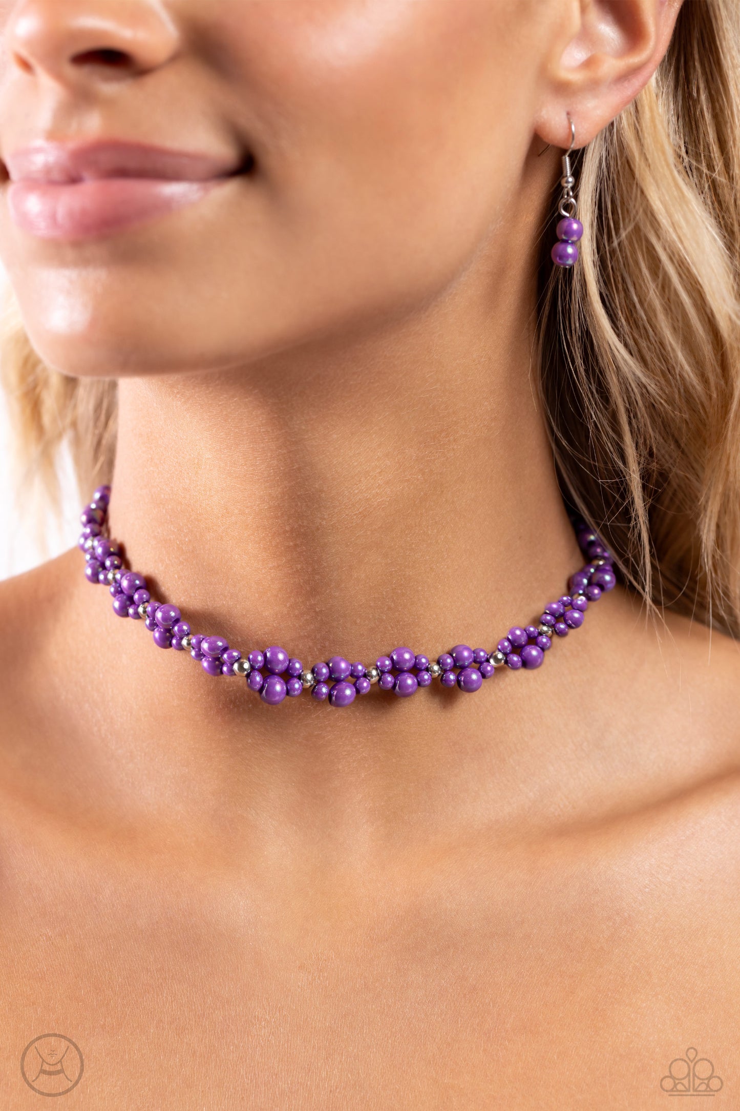 Paparazzi Accessories Dreamy Duchess - Purple Dipped in an iridescent finish, varying sizes of purple pearls cluster around the neckline in a dreamy pop of color. Dainty silver beads alternate along the collar and pearly clusters for a touch of industrial