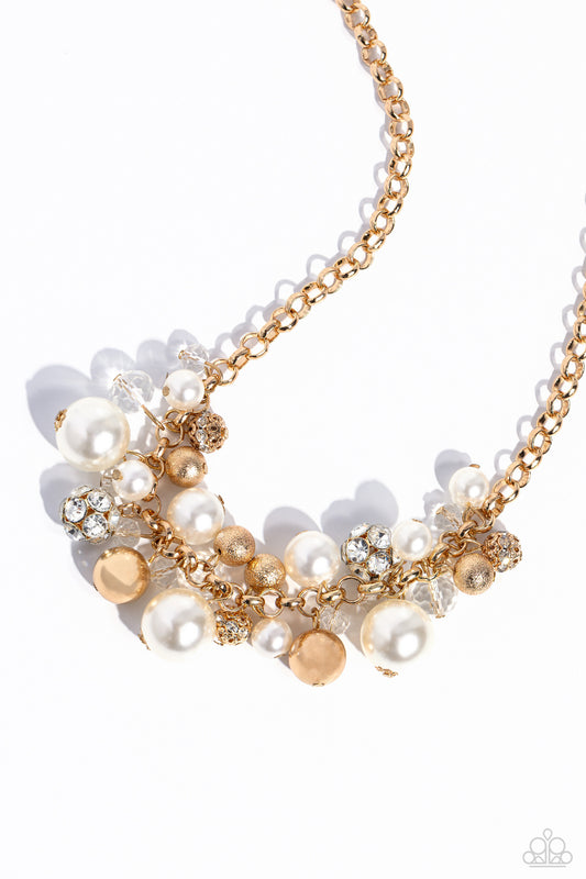 Paparazzi Accessories Corporate Catwalk - Gold A collection of bubbly white pearls, glittery crystal-like beads, gold beads, some embossed in shimmer, and gem-encrusted beads swing from the bottom of a chunky gold chain, creating an elegantly clustered fr