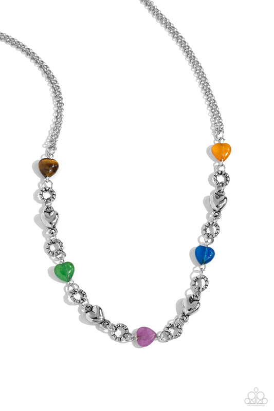 Paparazzi Accessories My HEARTBEAT Will Go On - Multi Heart-shaped lapis, jade, amethyst, tiger's eye, and orange stones and sleek silver hearts alternate along the neckline from a double strand of shimmery silver chains. Bubbly textured silver rings sepa