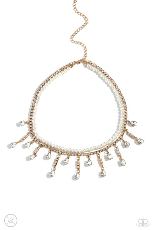 Paparazzi Accessories Lessons in Luxury - Gold Featuring a white rhinestone square-fitting chain, white teardrop-cut gems, bordered in gold pronged fittings, swing from streams of glittery rhinestones while solitaire teardrop gems drip in an alternating p