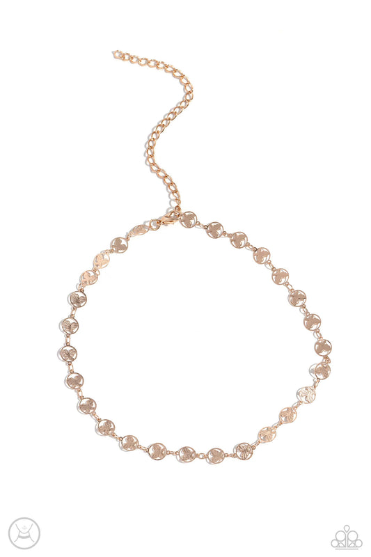 Paparazzi Accessories Fluttering Festival - Rose Gold Dainty rose gold butterfly charms, embedded in airy circles, are threaded around the collar creating a whimsical statement. Features an adjustable clasp closure. Sold as one individual choker necklace.