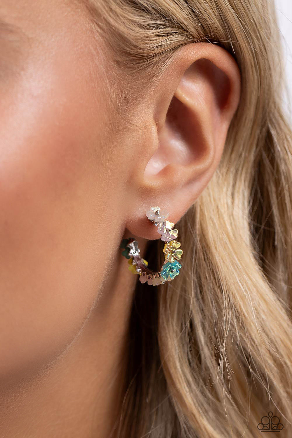 Paparazzi Accessories Floral Focus - Multi Tiny white, light pink, yellow, and light blue iridescent flowers connect to one another as they wrap around the ear to create a charming, dainty hoop. Earring attaches to a standard post fitting. Hoop measures a