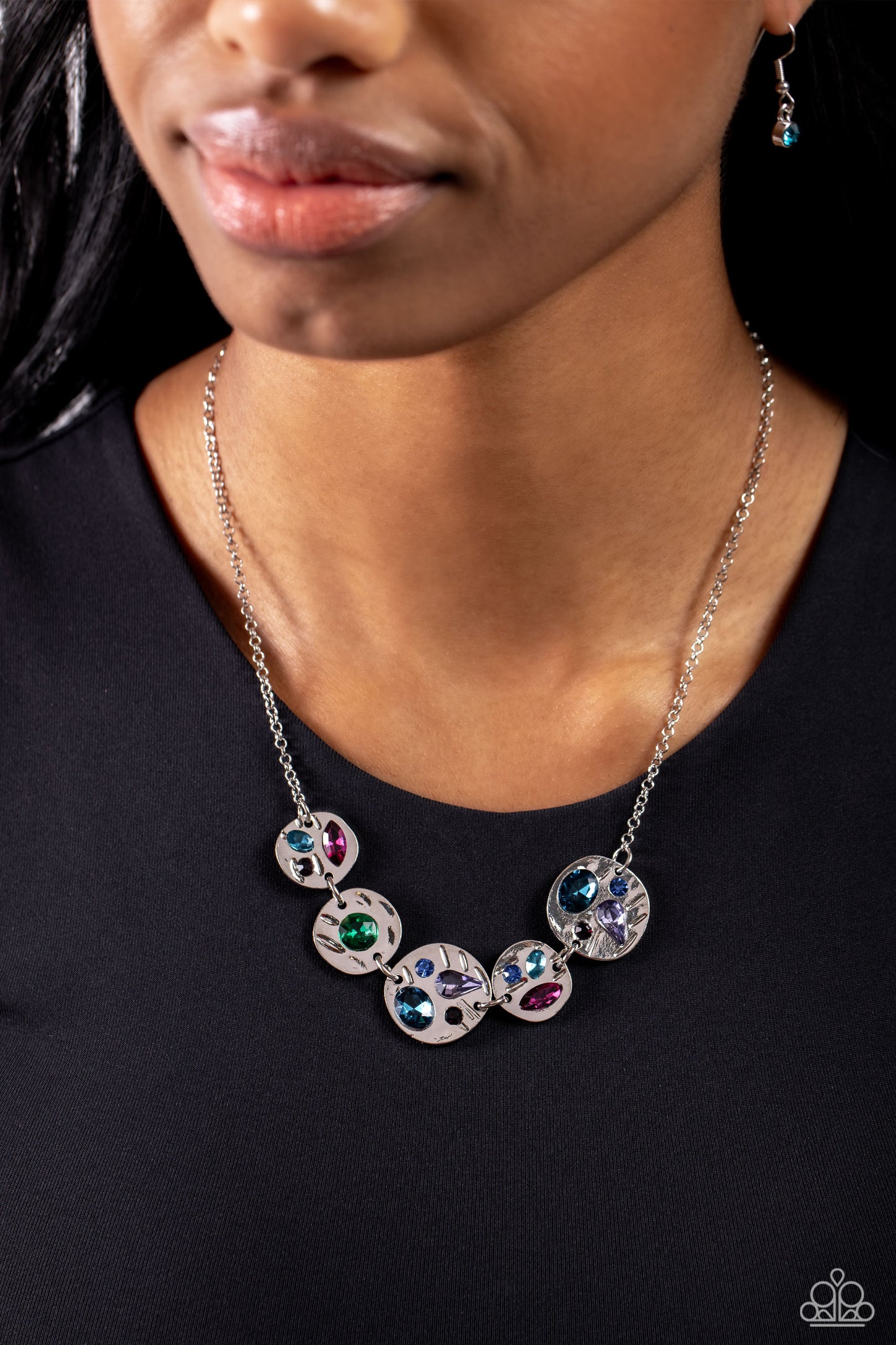 Paparazzi Accessories Handcrafted Honor - Multi Falling down the neckline from a shimmery dainty silver chain, silver hammered discs embellished with shimmery pink, blue, purple, and green gems in round, teardrop, oval and marquise cuts, sparkle and shine