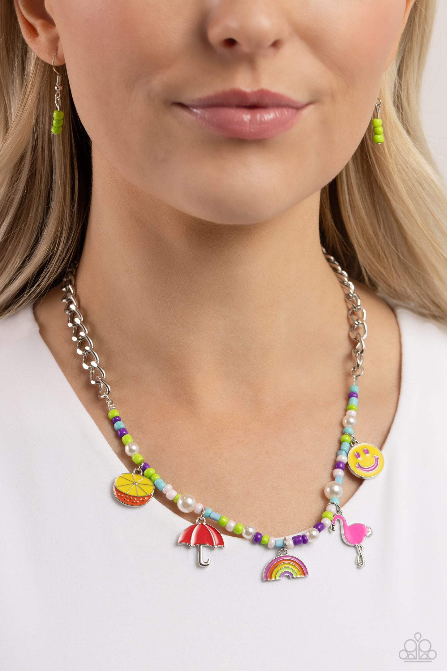 Paparazzi Accessories Summer Sentiment - Multi A thick, flat silver curb chain leads down the neckline to a section of purple, baby pink, light blue, and Kohlrabi seed beads and various-sized white pearls. A collection of seasonal charms gather along the