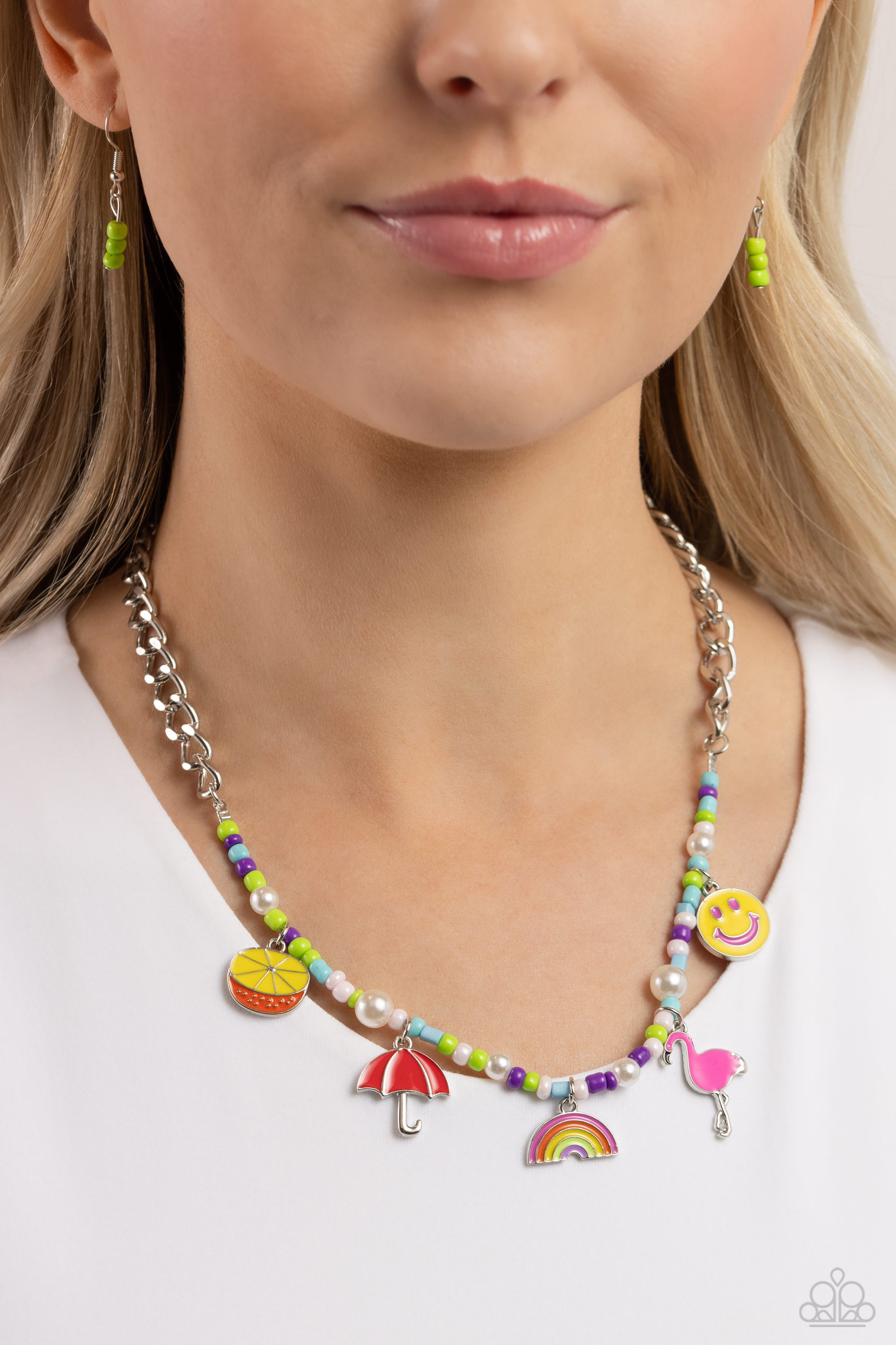 Paparazzi Accessories Summer Sentiment - Multi A thick, flat silver curb chain leads down the neckline to a section of purple, baby pink, light blue, and Kohlrabi seed beads and various-sized white pearls. A collection of seasonal charms gather along the