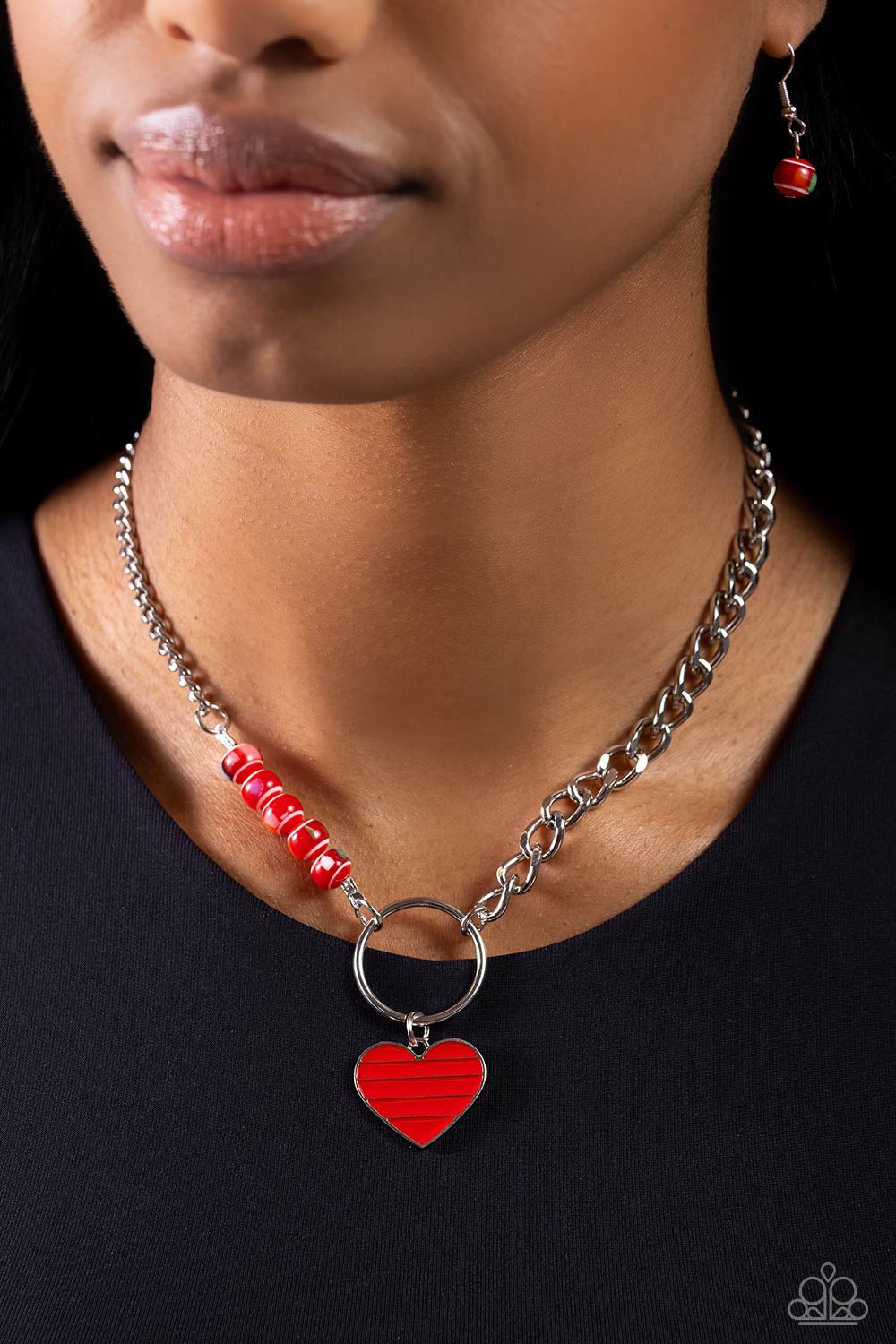 Paparazzi Accessories Mismatched Mayhem - Red A strand of flat silver curb chain collides with a classic chain and a vivacious collection of red beads, featuring various multicolored splatters across its surface, to create an abstract blend of color and c