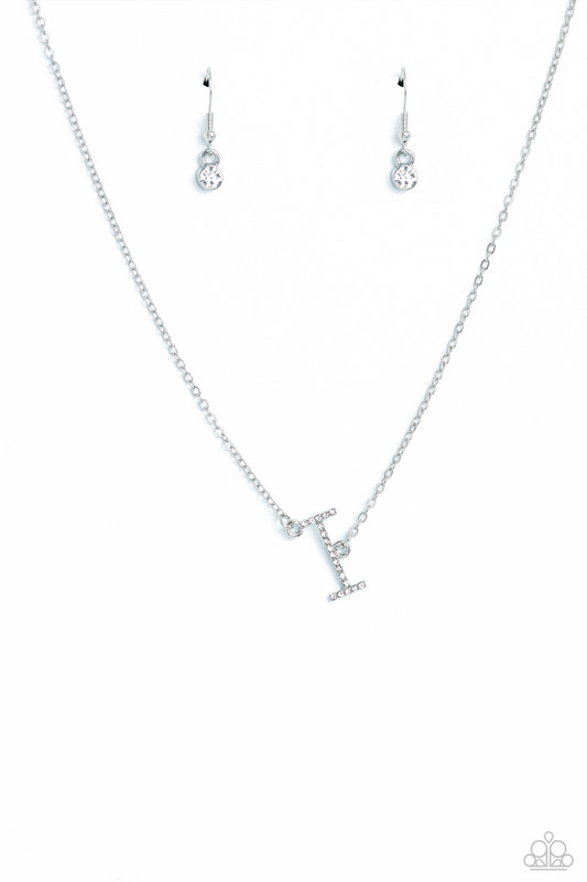 Paparazzi Accessories INITIALLY Yours - I - White Embossed with dainty white rhinestones, a silver letter "I" hovers below the collar from a dainty silver chain, for a sentimentally simple design. Features an adjustable clasp closure. Sold as one individu