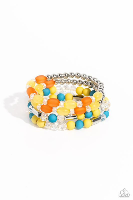 Paparazzi Accessories Glassy Gait - Multi A shimmery collection of silver beads and accents, glassy long orange and yellow beads, faceted clear beads, and yellow and turquoise acrylic beads are threaded along stretchy bands around the wrist, creating glis