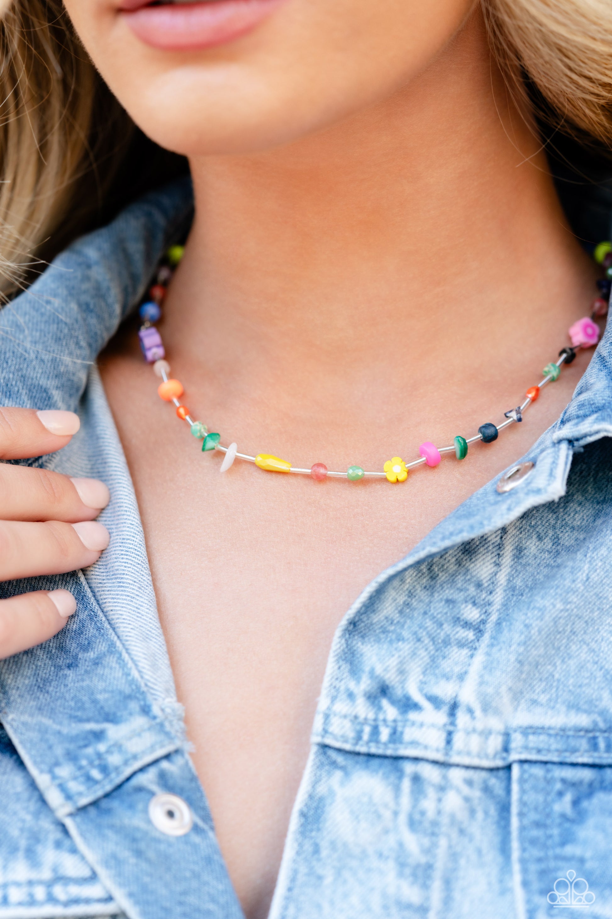 Paparazzi Accessories Ambitious Assortment - Multi Infused on an invisible wire, an assortment of multicolored beads, acrylics, and chiseled stones alternating with dainty silver rods coalesce around the neckline for a youthful pop of color. Features an a